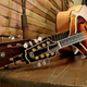 An old photo I took of my mandolin with the guitar Martin built for my dad